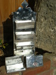 This picture is a business card holder for my daughters new business. The top was taken from a colonial comb holder. The two boxes below hold about 30 business cards.