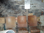 Bills' 5 seat Theatre. The only one in amana (but only 4 can sit as one seat is broken. the projector and Screen is a 12 inch TV with a built in VCR.